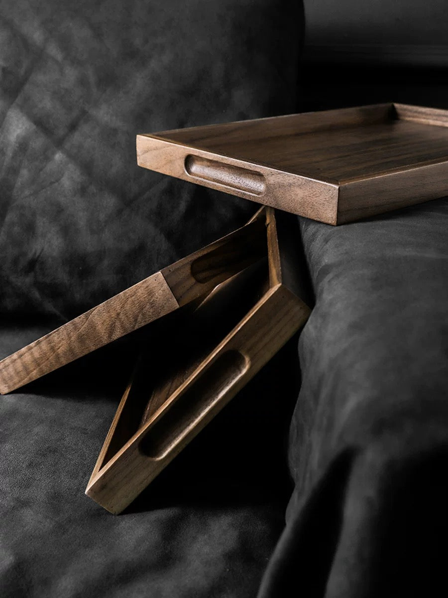 Wooden tray on a dark surface