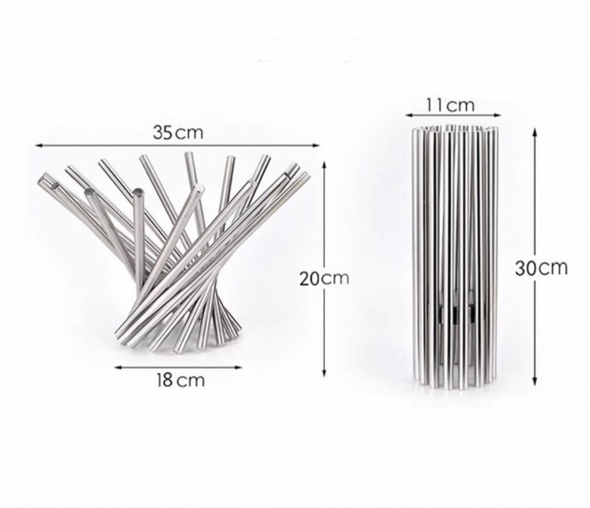 Metal straws with measurements on a white background