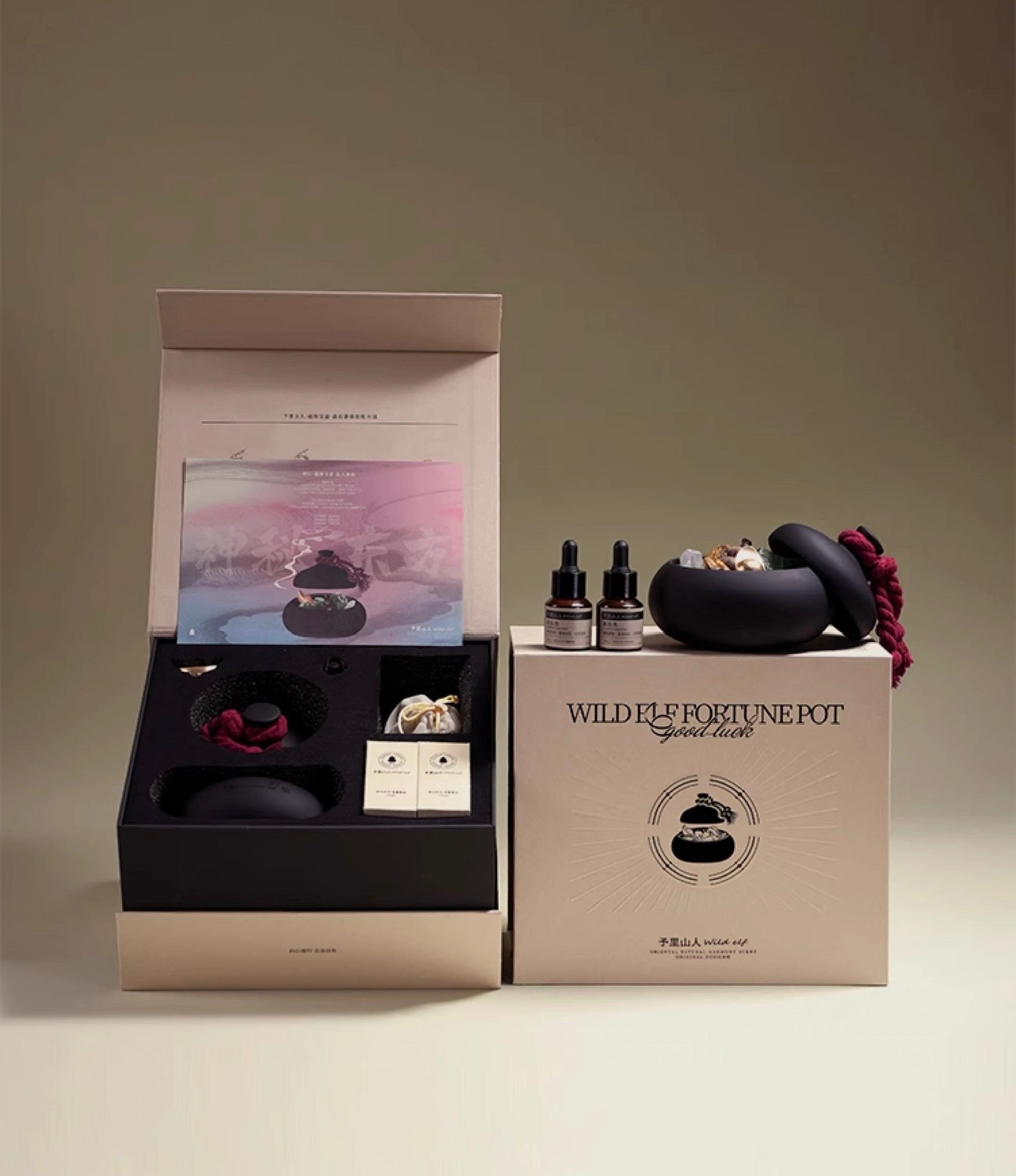 Tea set packaging with tea pots and accessories on a neutral background