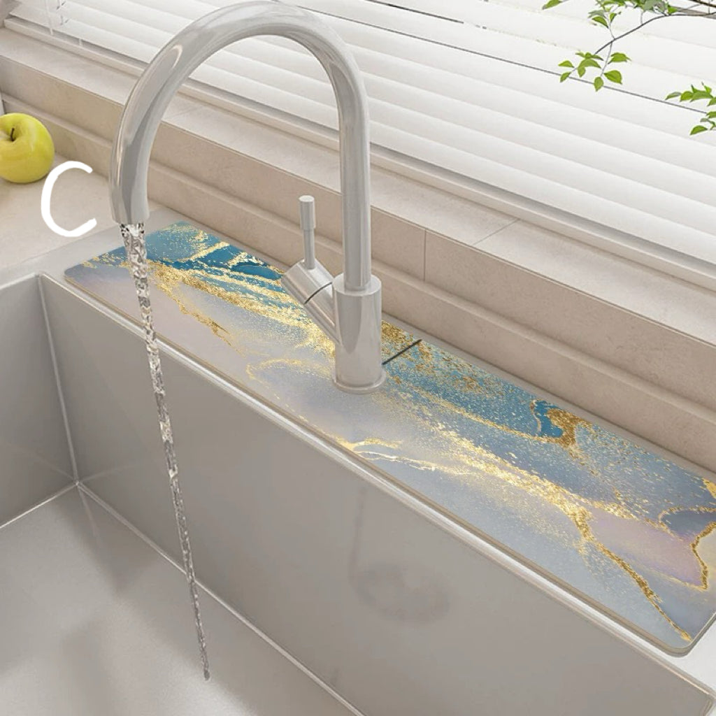 Kitchen sink with marble-like countertop and modern faucet