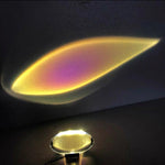 Light bulb with glowing sand inside on a dark background