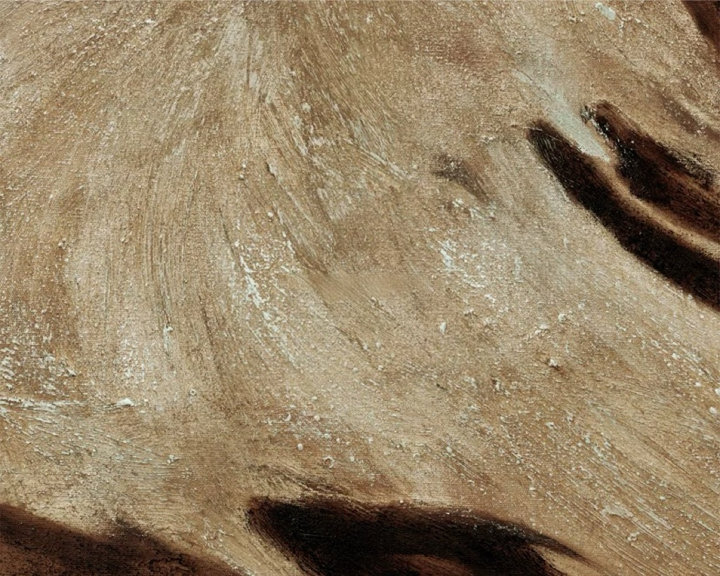 Close-up of textured beige surface with brown accents