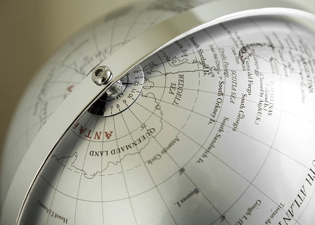 Close-up of a vintage-style globe with detailed map and compass rose.