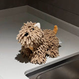 Textured lion-shaped object on a gray surface