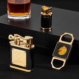 Set of black and gold smoking accessories including a lighter, bottle opener, and glass on a dark surface.