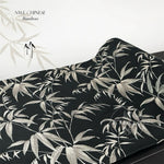 Fabric with silver bamboo leaf pattern on black background, brand 'NWE CHINESE' visible.