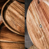 Close-up of wooden trays with a focus on texture and grain.