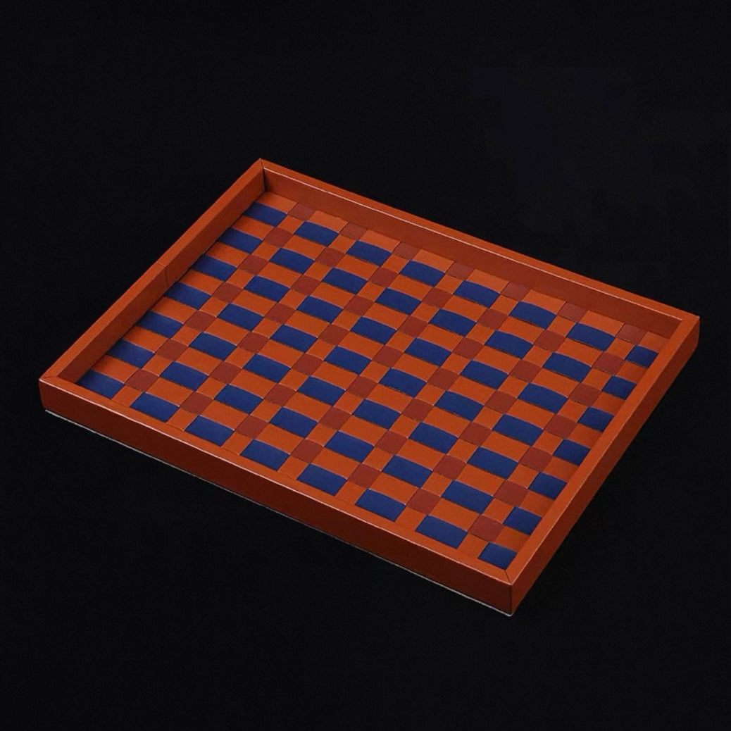 Wooden tray with blue checkered pattern on a black background