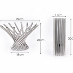 Metal straws with measurements on a white background