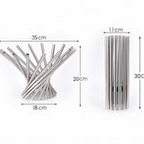 Metal straws with measurements on a white background