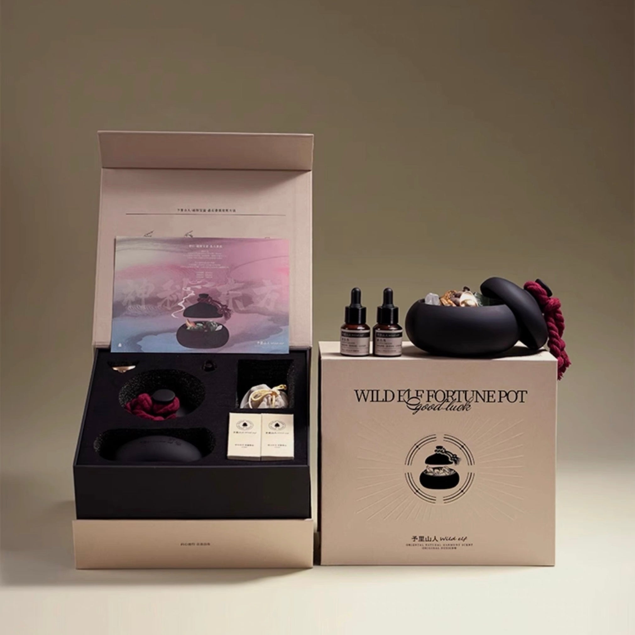 Tea set packaging with tea pots and accessories on a neutral background