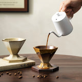 pouring coffee into ceramic hexagonal mug – handcrafted rustic stoneware coffeeware set
