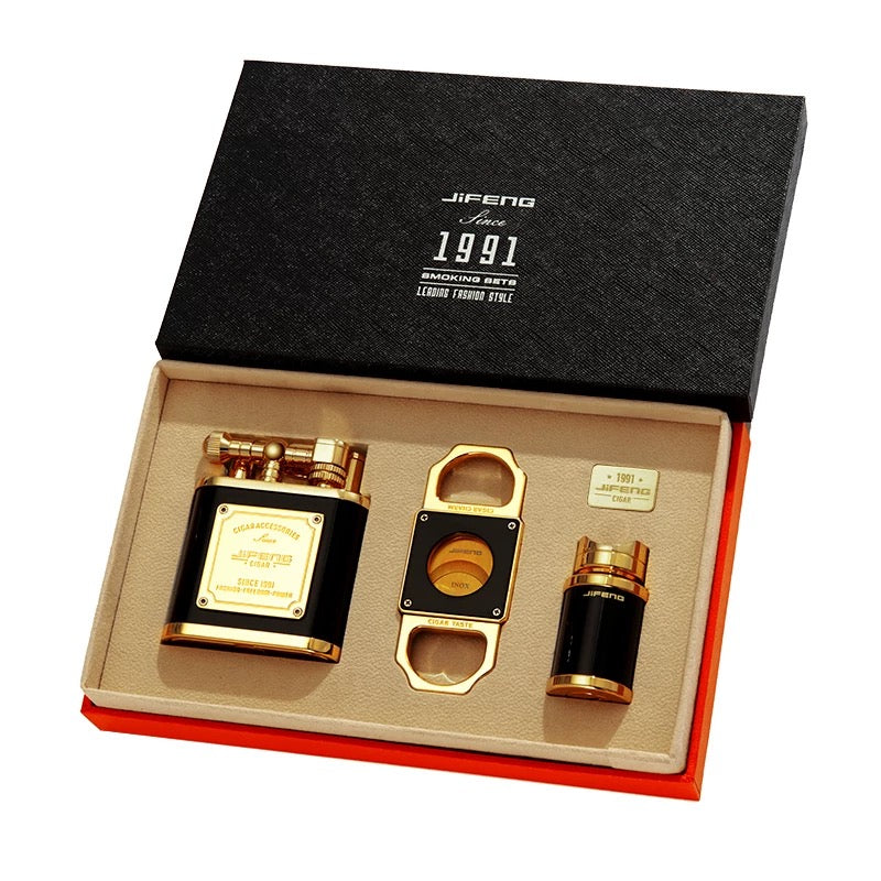 Cigar accessories set including a humidor, cutter, and lighter in a Jifeng box.