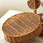 Woven basket with a lid on a light surface
