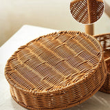 Woven basket with a lid on a light surface