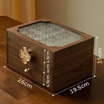 Wooden jewelry box with dimensions on a wooden surface
