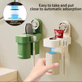 Hands-free magnetic attachment rinse cup for toothbrushes with easy grab and release function