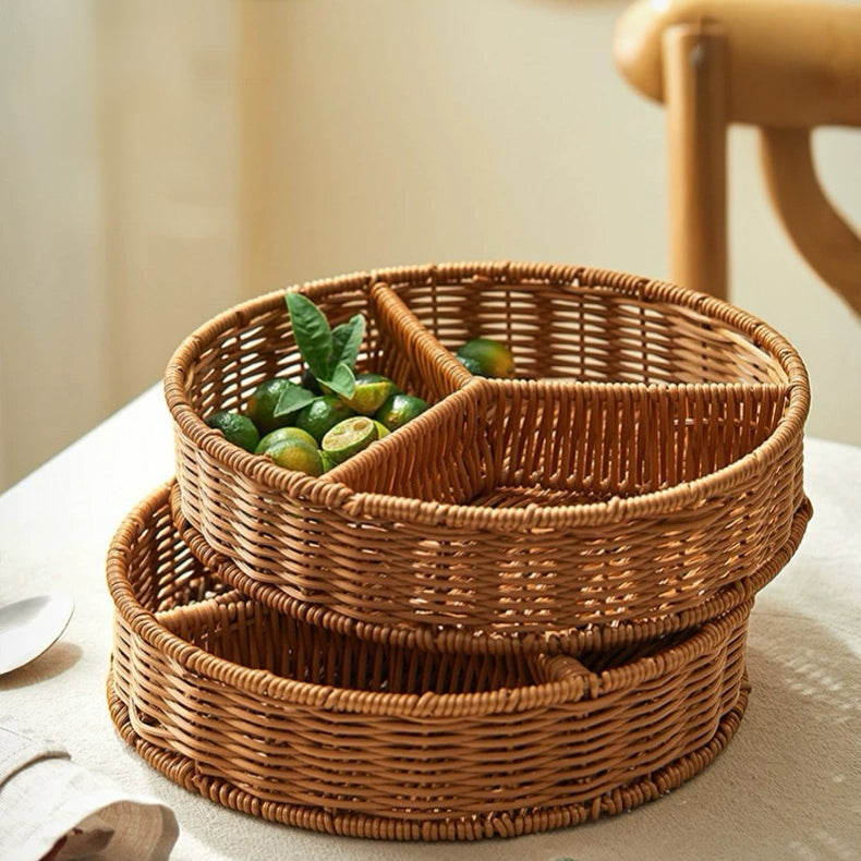 Wicker fruit basket with two compartments on a light surface