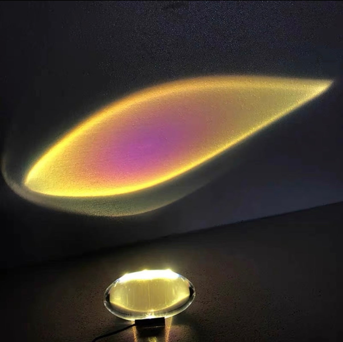 Light bulb with glowing sand inside on a dark background