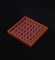 Wooden checkers board with alternating brown and blue squares on a black background