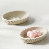 Two ceramic bowls on a light gray background