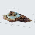 Decorative item with measurements on a white background