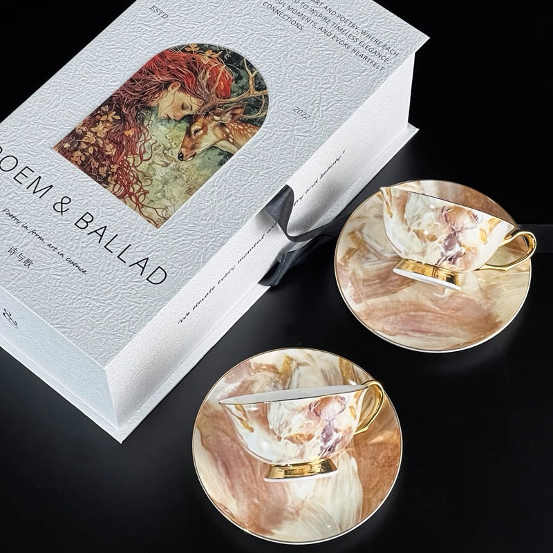 Two decorative coasters with artistic designs on a 'DEM & BALLAD' branded box.